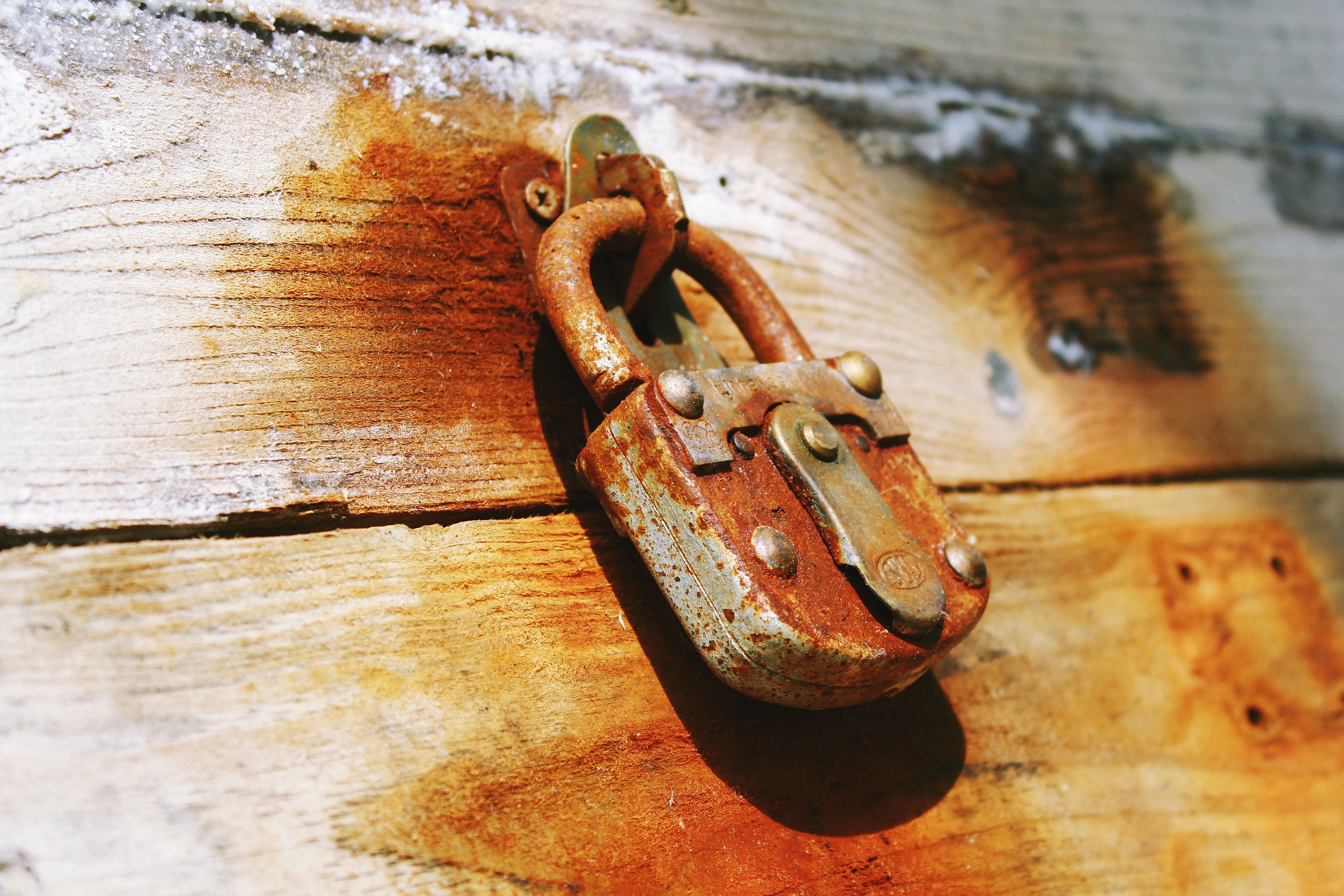 A physical padlock securing a door, symbolising a genuine offline barrier